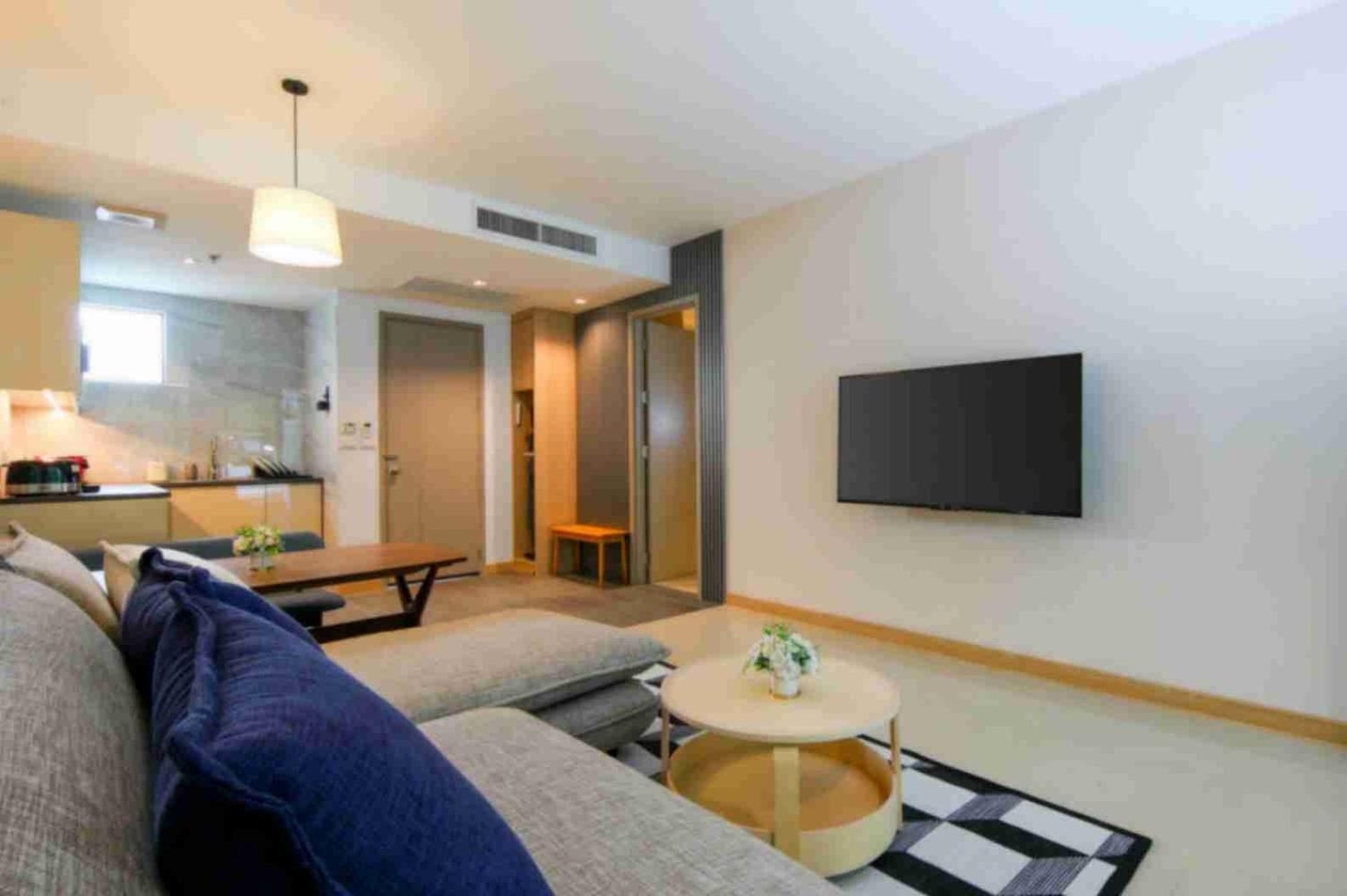 Craft Resort & Villas, Phuket Town Eksteriør bilde A living room in a serviced apartment in Beijing, China