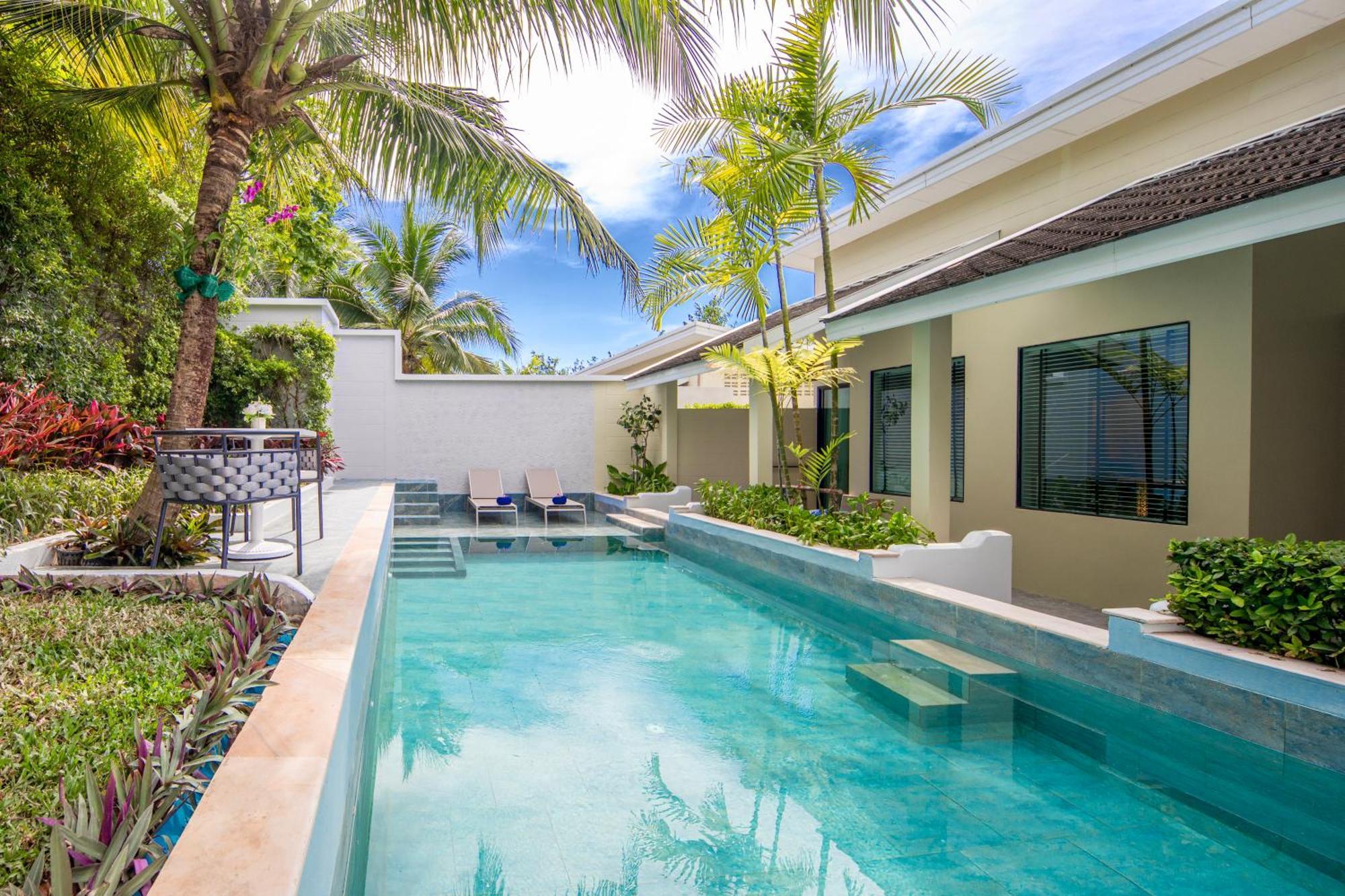 Craft Resort & Villas, Phuket Town Eksteriør bilde The swimming pool at the hotel