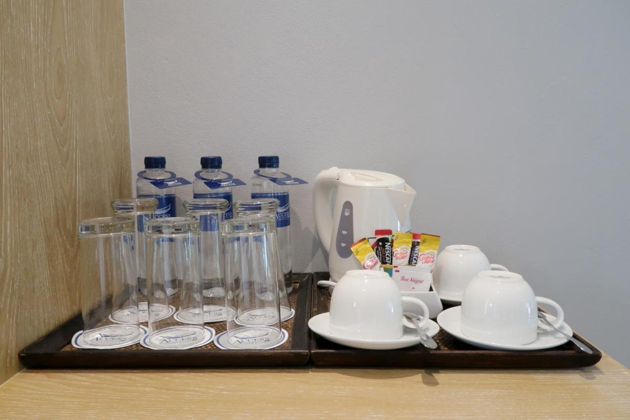 Craft Resort & Villas, Phuket Town Eksteriør bilde A typical hotel welcome drink tray